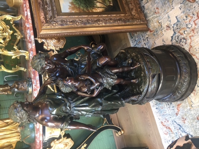 Bronze beautiful bronze statue on a revolving pedestal! Signed Ramcoulet Total height 107 cm and diameter pedestal 43 cm